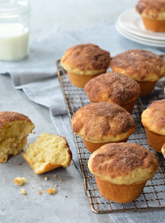 Doughnut muffins on a wire rack.