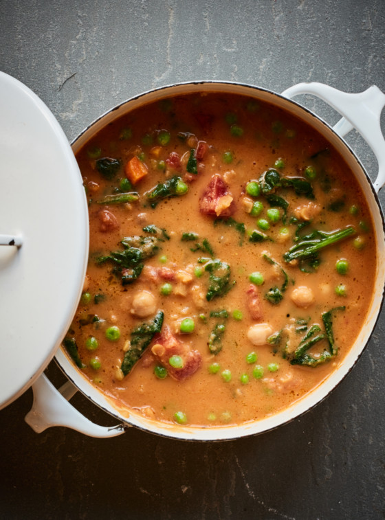 Pot of smoky chickpea, red lentil, and vegetable soup.