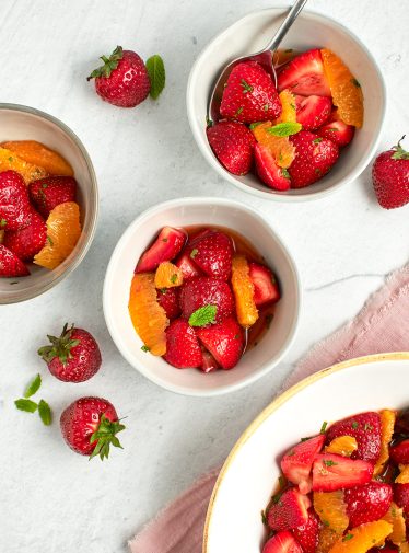 orange and strawberry salad in bowls
