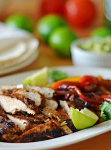 Chicken fajita fixings on a plate.