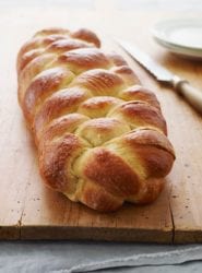 Challah on a wooden surface.