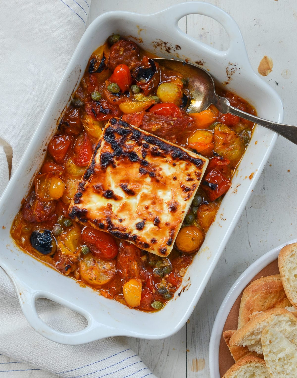 Broiled Feta with Garlicky Cherry Tomatoes & Capers image