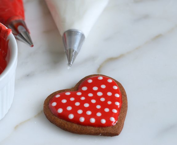 Heart cookie decorated with polka dots.