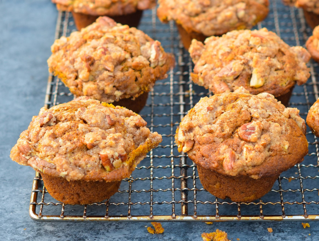 Pumpkin muffins on a wire rack.