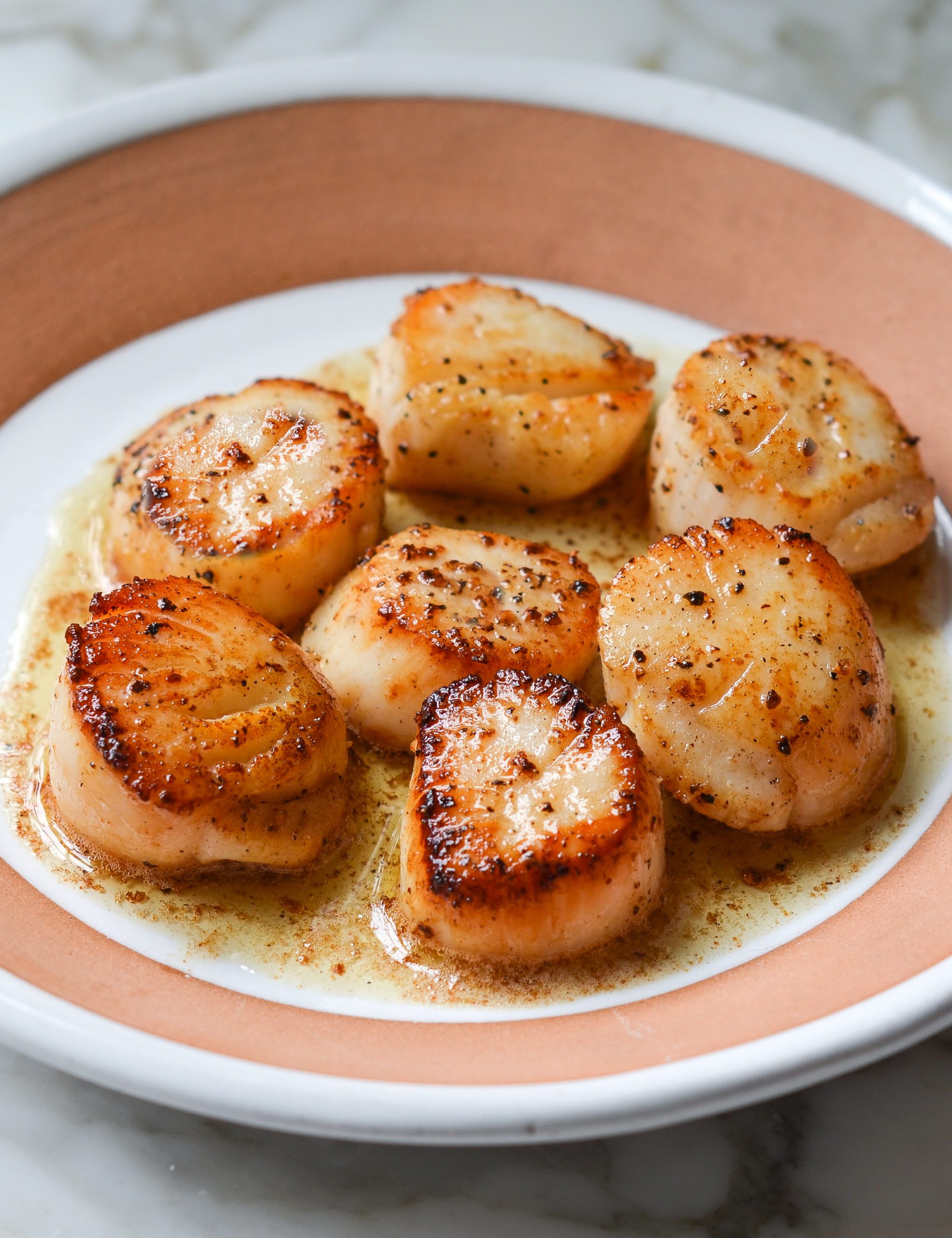 https://www.onceuponachef.com/images/2022/03/how-to-cook-scallops-2-scaled.jpg