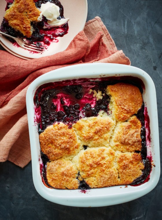 Baking dish of blueberry cobbler.