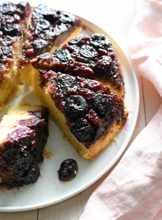 Sliced cherry cornmeal upside-down cake.