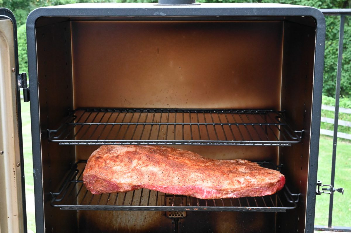 brisket in smoker with the fat side up