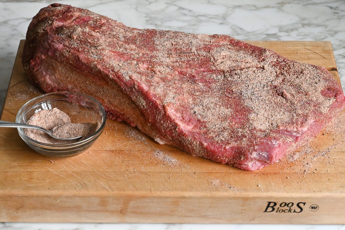 coating the brisket with spice rub