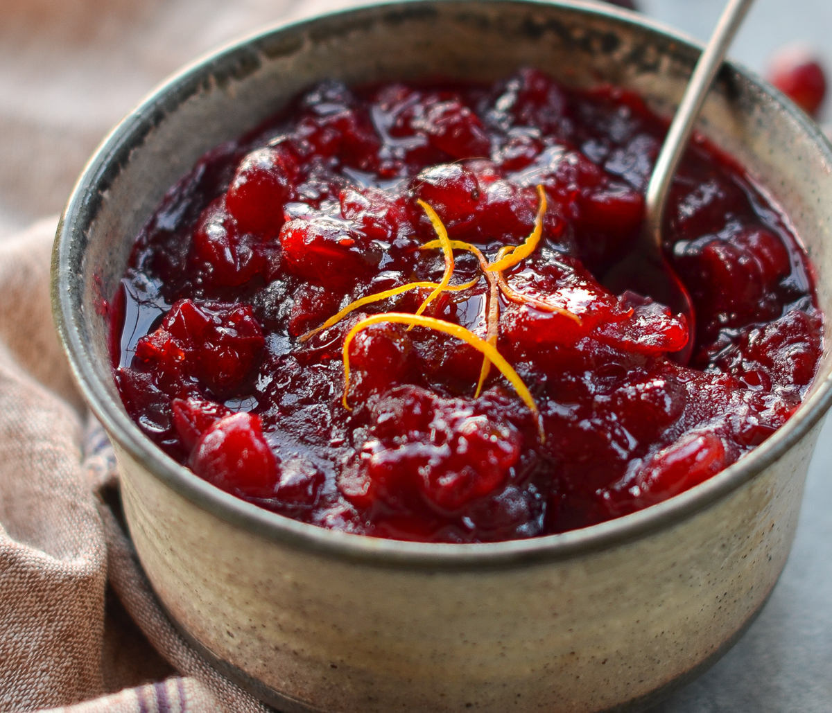 A small bowl of cranberry sauce.