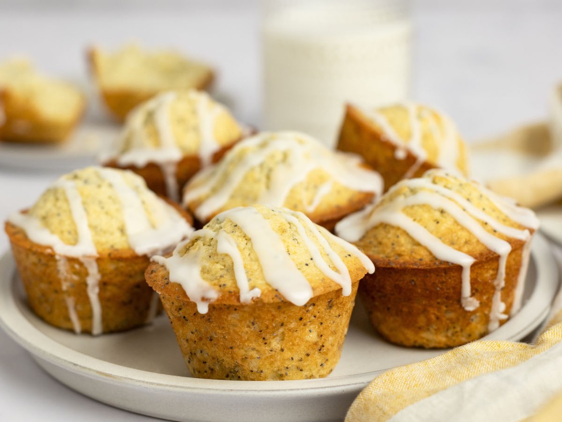 lemon muffins on platter with yellow and white stripe napkin