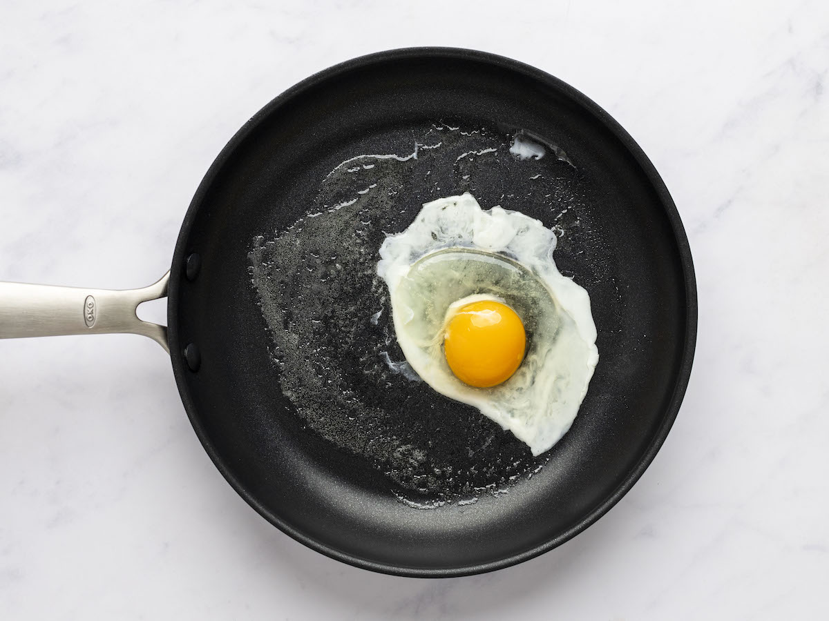egg starting to cook in medium non-stick pan