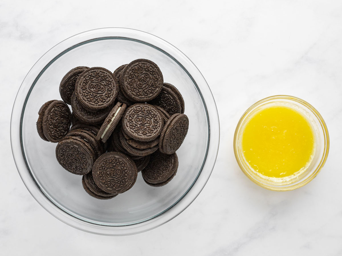 bowl of Oreo cookies and bowl of melted butter