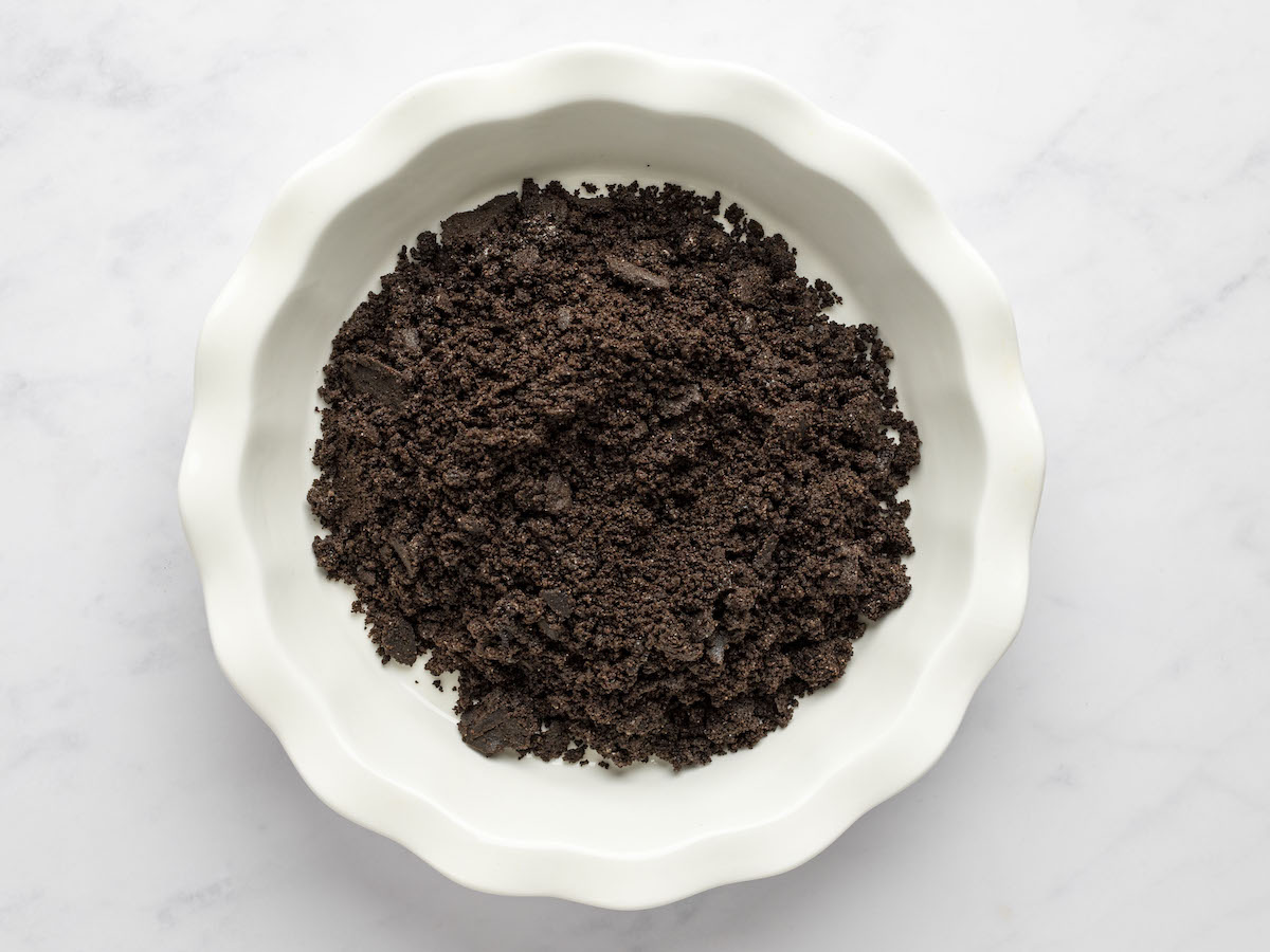 oreo cookie crumbs in a pie dish.