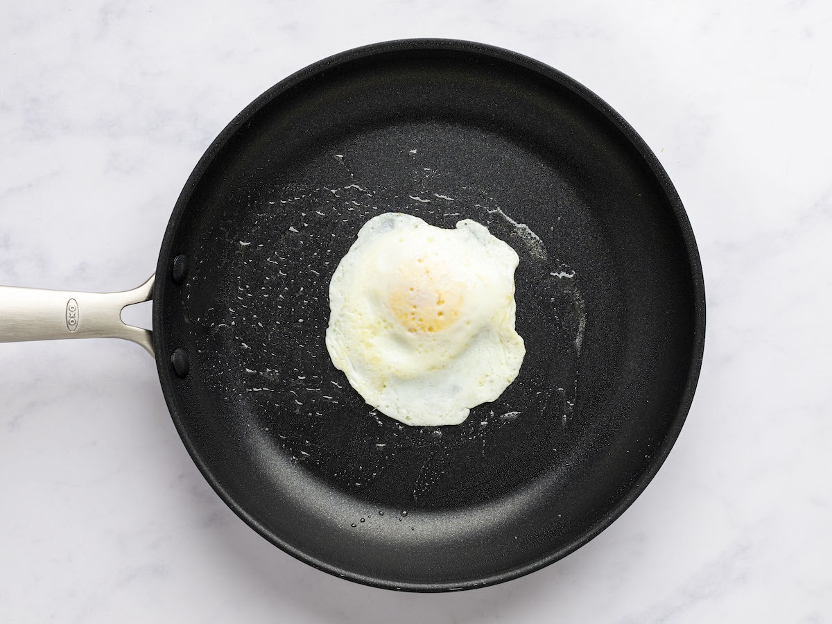 over easy egg cooking on second side in nonstick pan