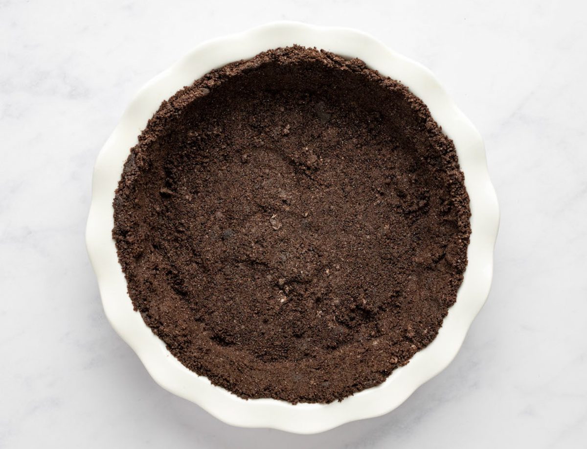 oreo crust pressed into pie dish and ready to bake.