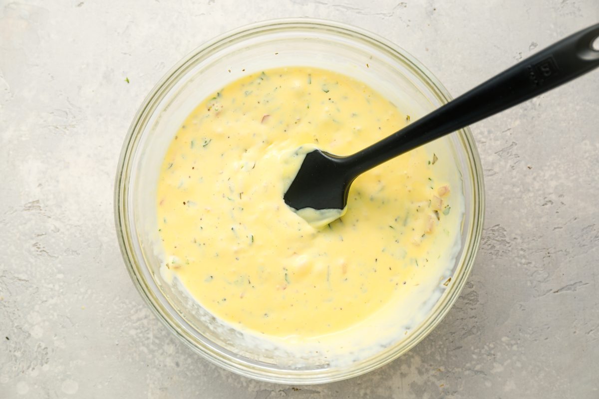 sauce in glass bowl with remaining tarragon and shallot reduction mixed in 