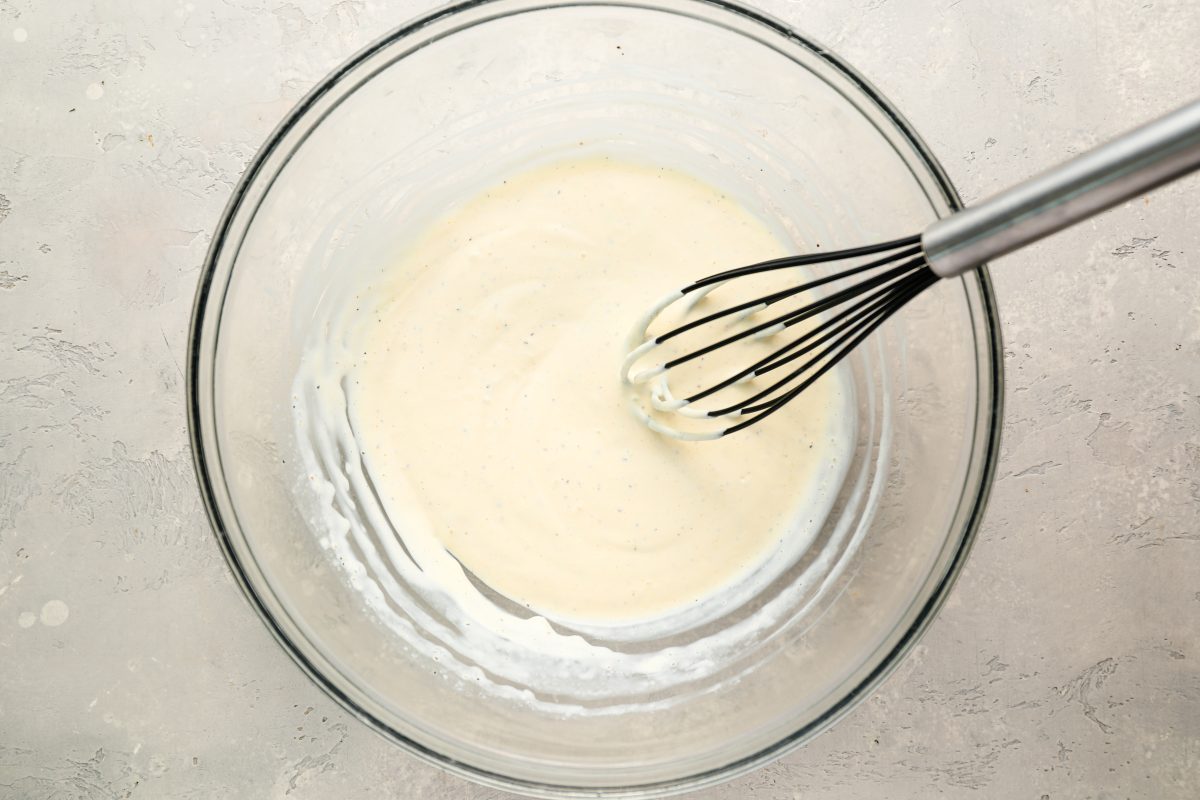 sour cream, mayonnaise, and seasoning whisked in bowl.