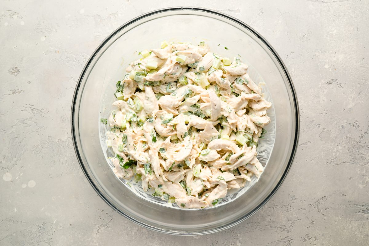 chicken salad mixed together in bowl