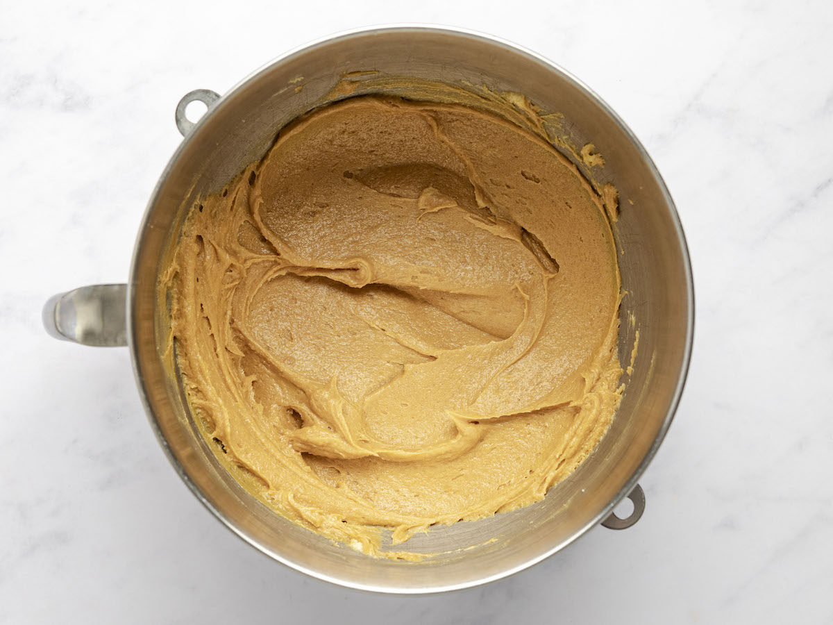 mixing bowl with peanut. butter and vanillla combined with butter/sugar/egg mixture