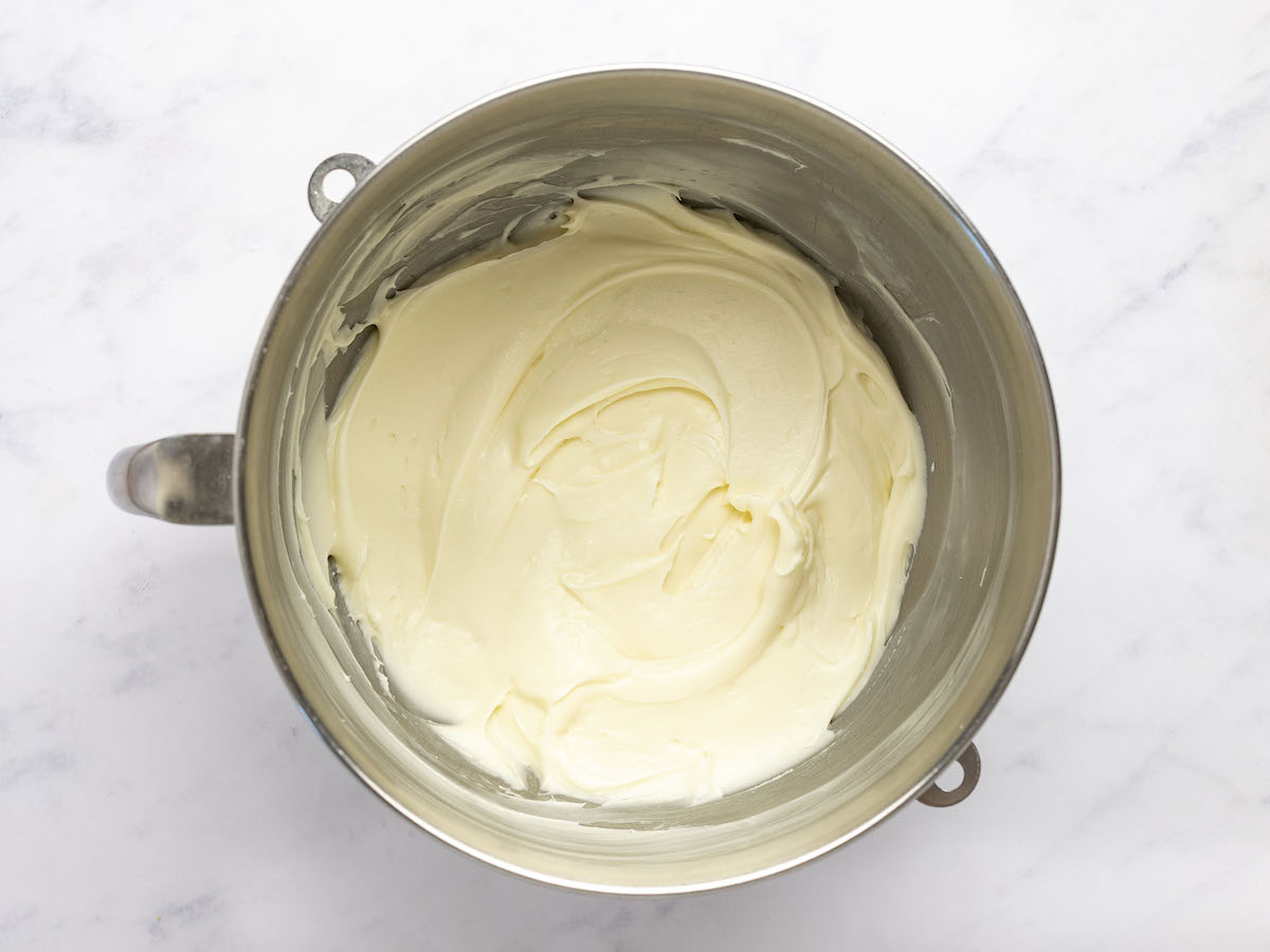 whipped frosting in mixing bowl