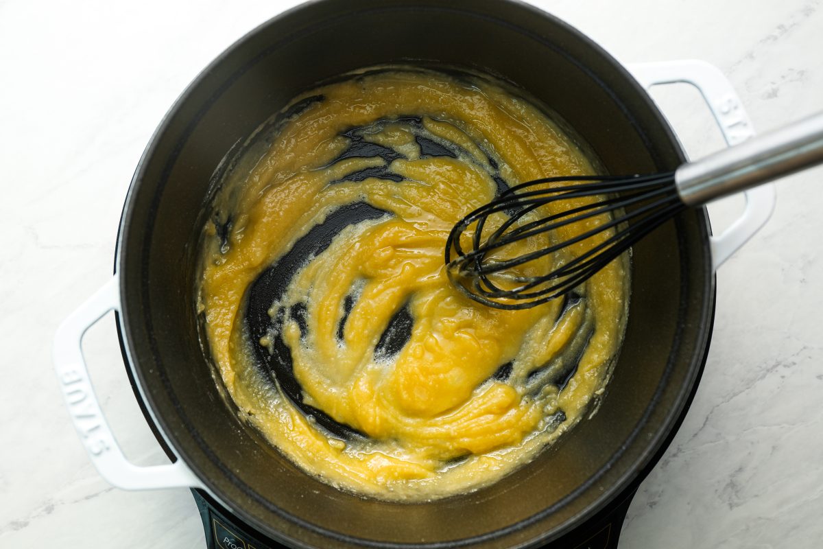 whisking roux in Dutch oven