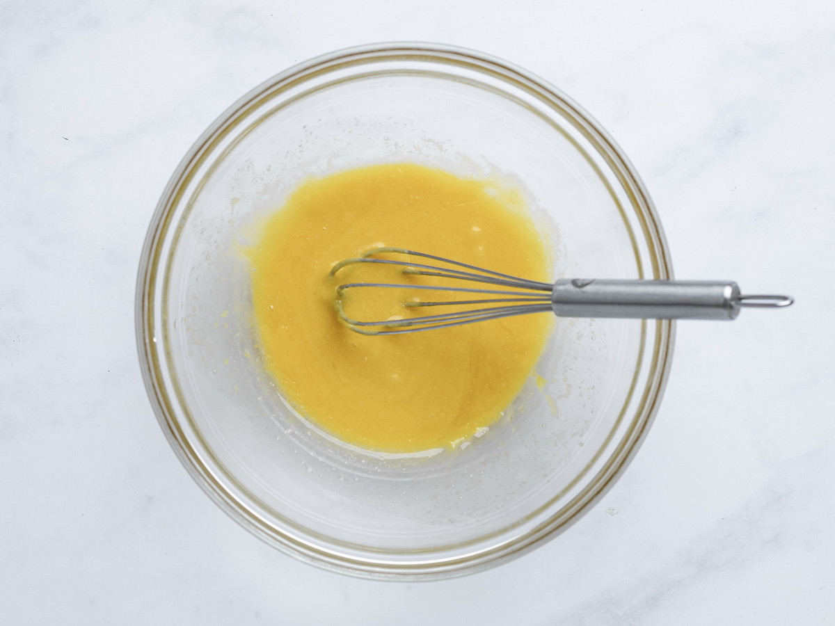 melted butter, vanilla, and egg yolk whisked in bowl
