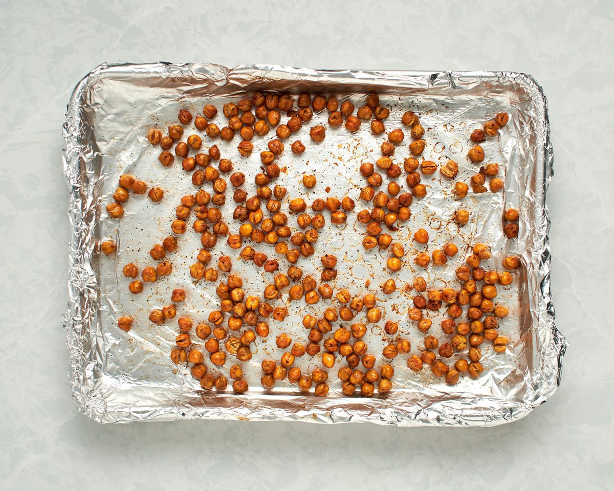 roasted chickpeas on foil-lined baking sheet