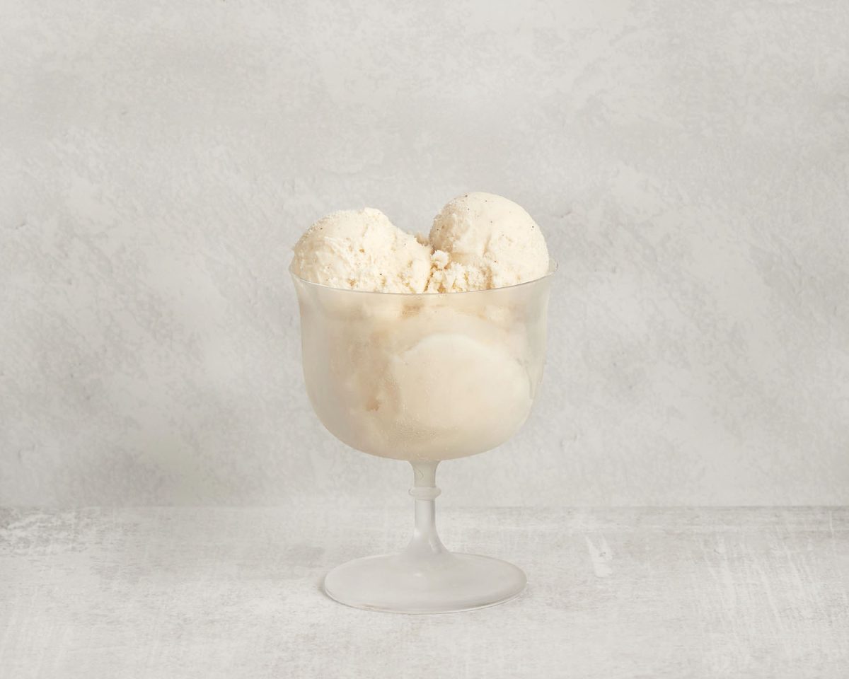 3 scoops of vanilla ice cream in sundae glass