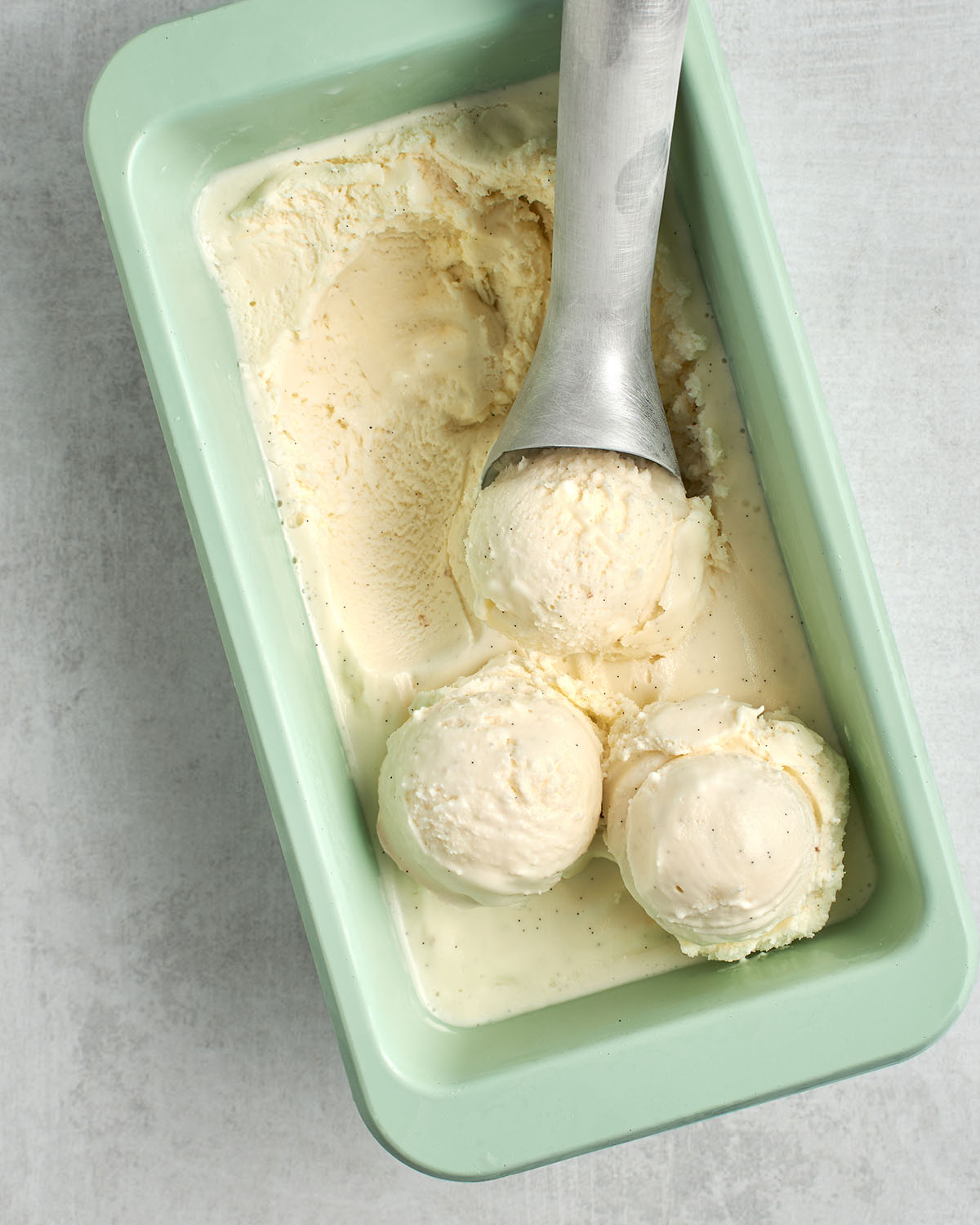 vanilla ice cream in mint green container