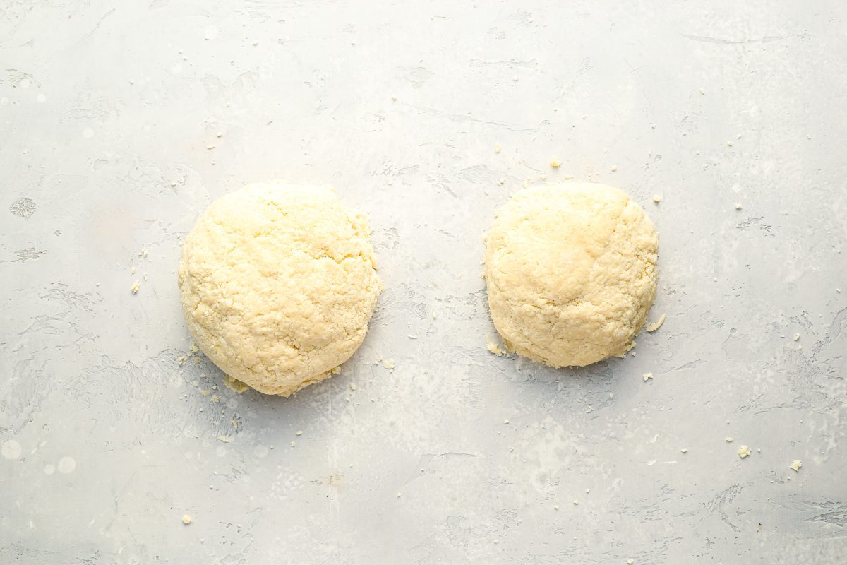 2 dough piles, the left pile slightly bigger than the right pile