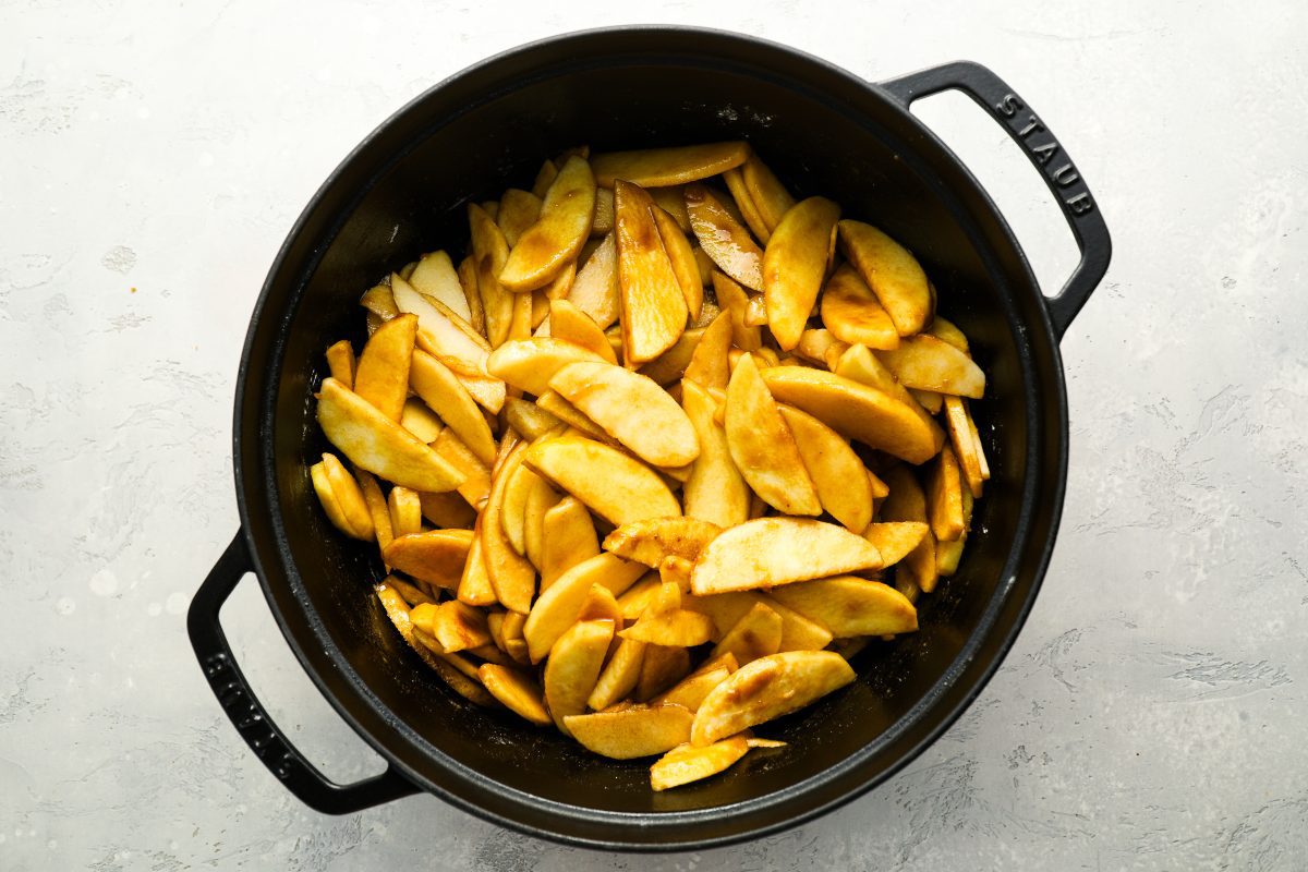 sliced apples, lemon juice, brown sugar, salt, cinnamon, flour, and cornstarch combined in large Dutch oven