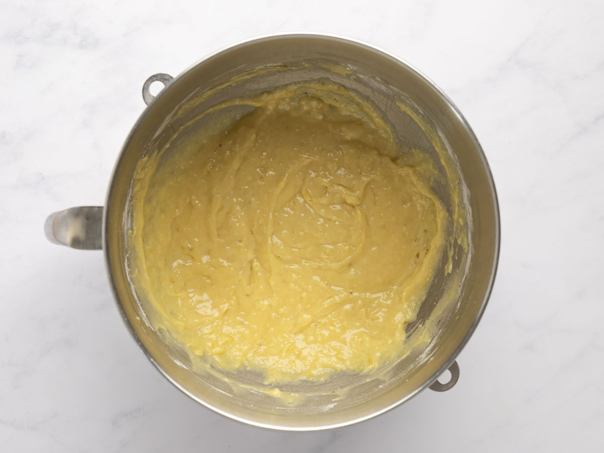 flour, salt, and baking powder fully combined with wet mixture in metal mixing bowl