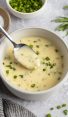 beurre blanc in bowl with spoon