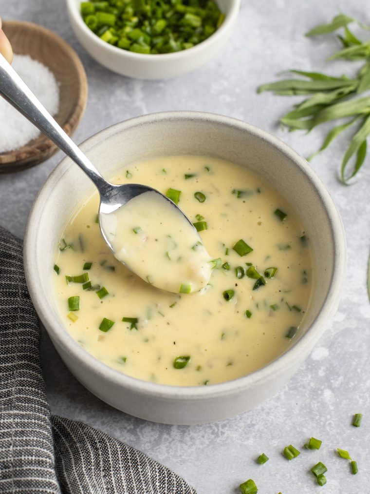 beurre blanc in bowl with spoon