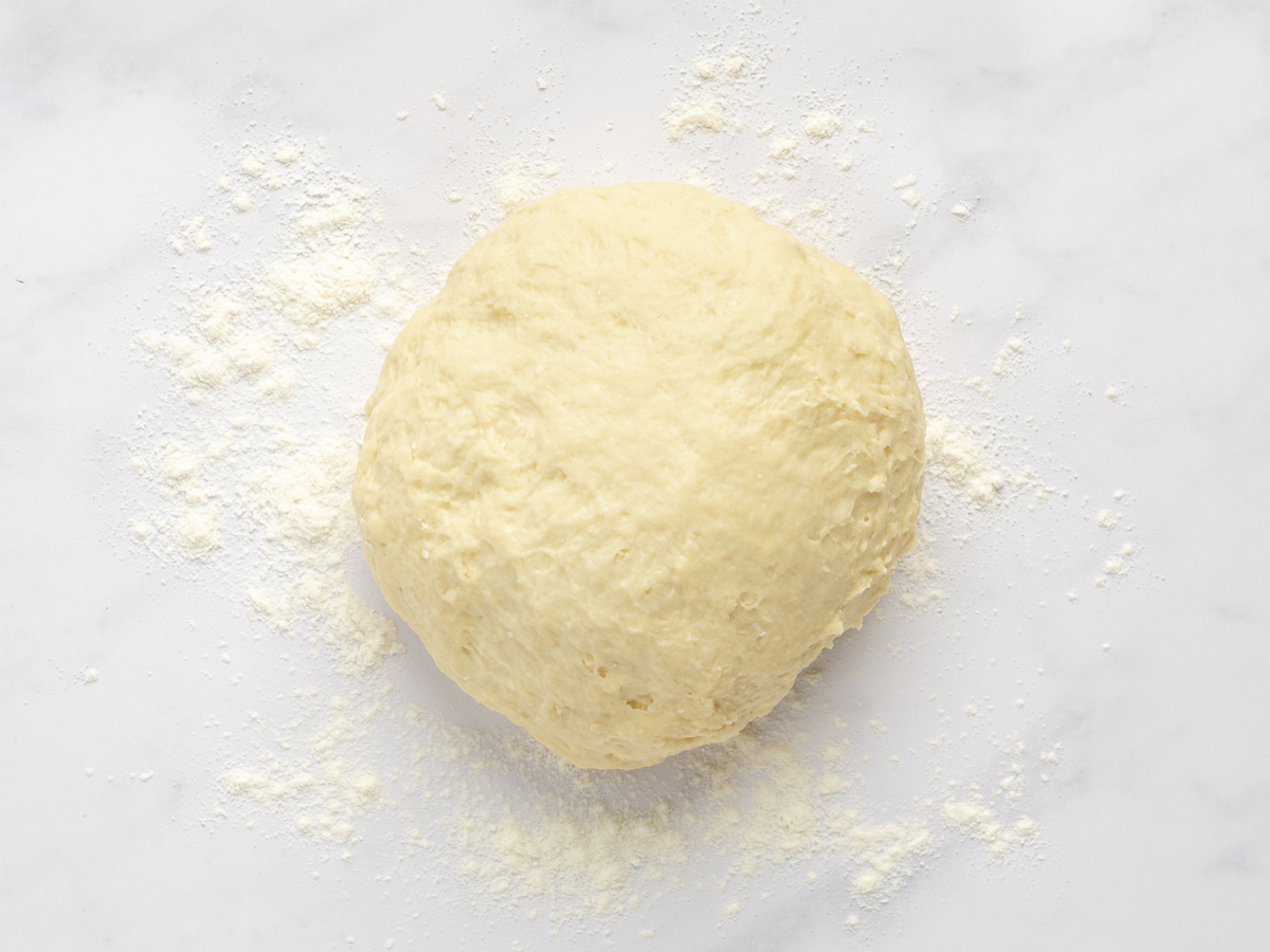 ball of dough on clean work surface