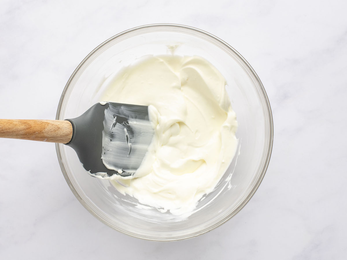 sour cream, cream cheese, and salt mixed together in small glass bowl