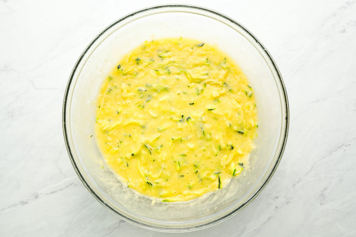 grated zucchini added to liquid ingredients