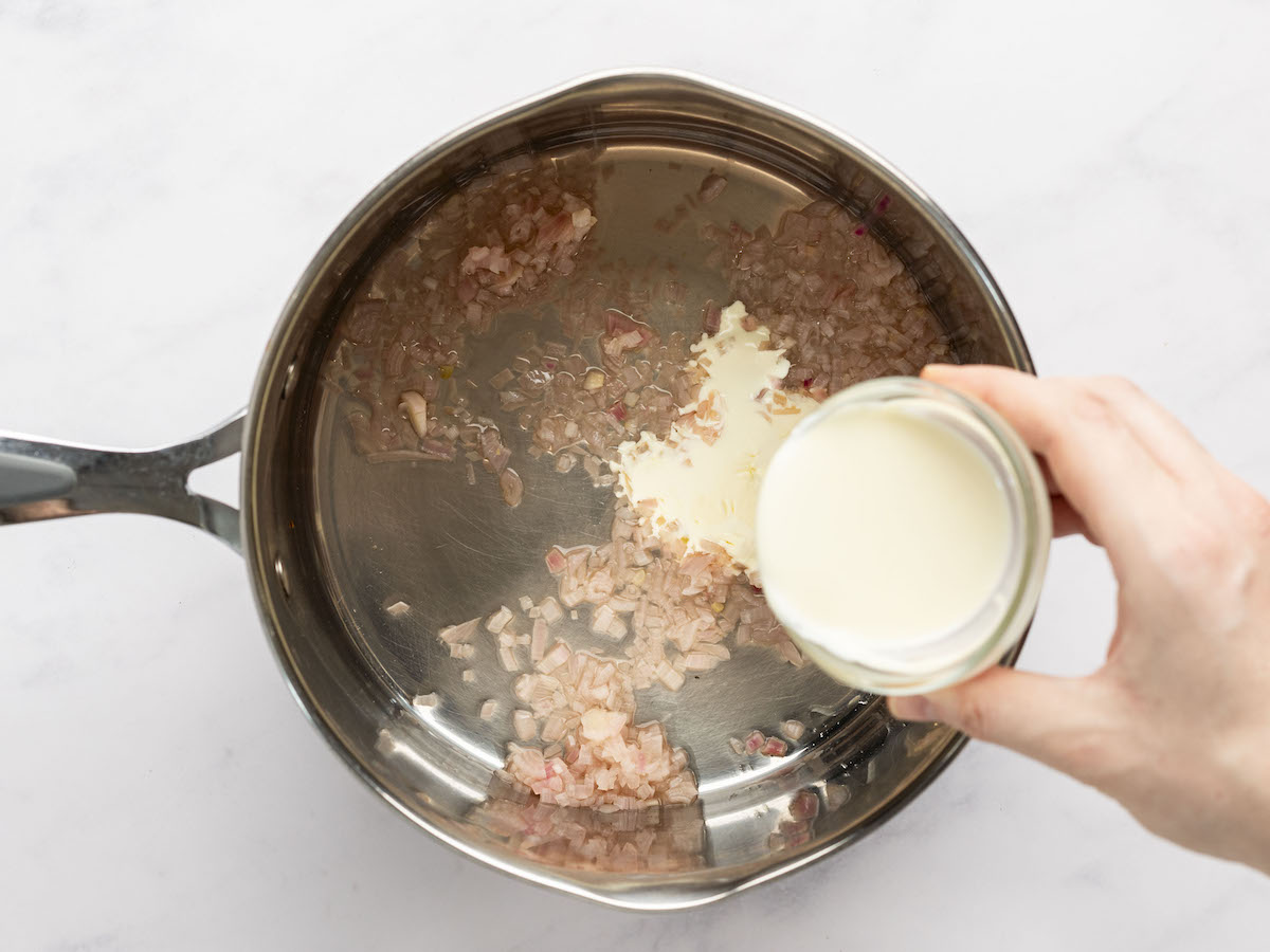 adding heavy cream to reduction