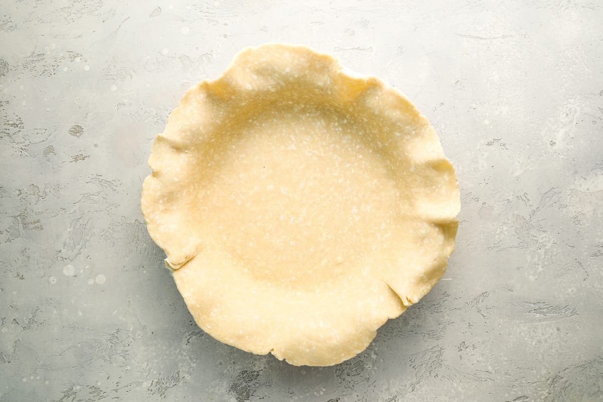 dough placed in 9-inch deep-dish pan pan