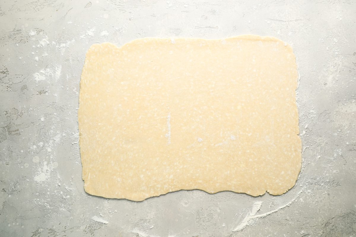 dough rolled into 10x15-inch rectangle on work surface