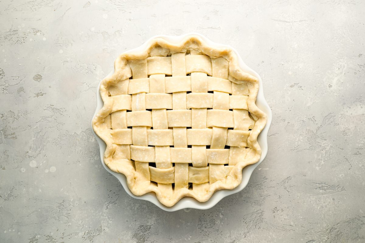 pie with edges crimped to seal top and bottom crusts