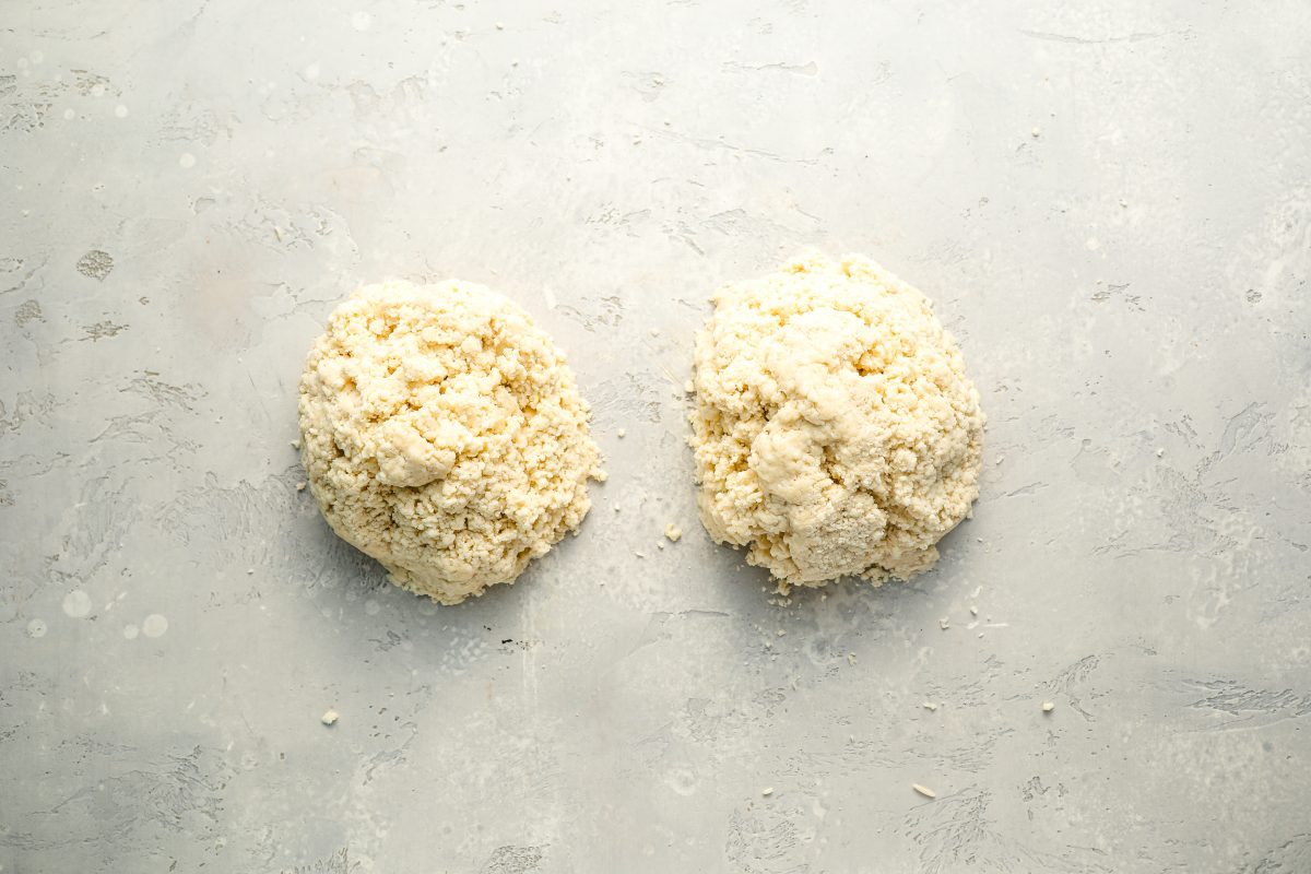 dough crumbles in two piles on work surface