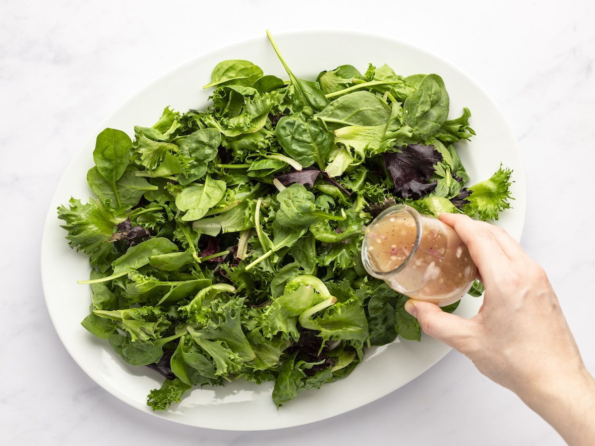 dressing the salad