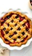 cherry pie with a bowl of cherries