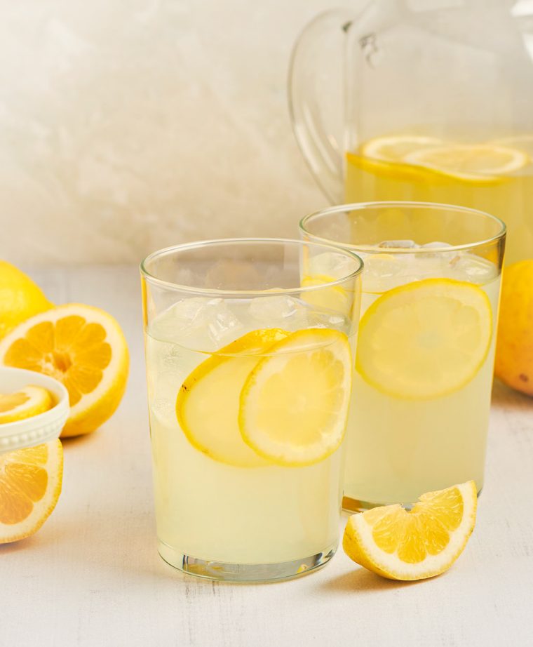 glasses of homemade lemonade with a pitcher