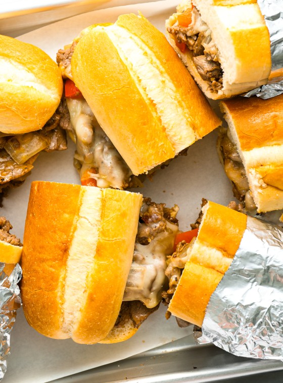 philly cheesesteak sandwiches on sheet pan