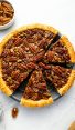 pecan pie sliced in pie dish