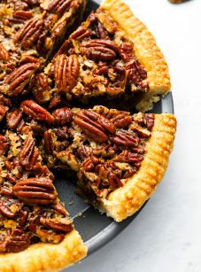 pecan pie sliced in pie pan