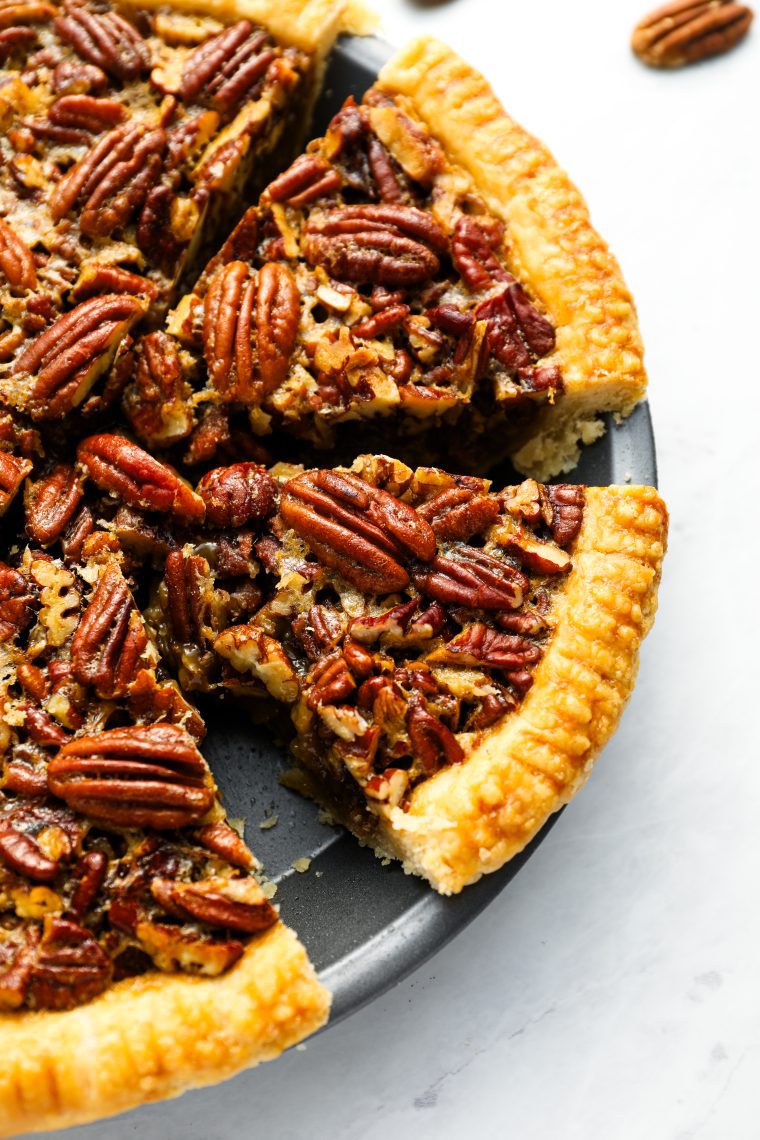 pecan pie sliced in pie pan